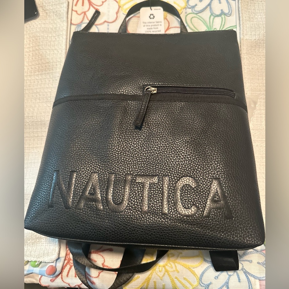 Nautica black multifunctional backpack purse with zippers pockets.